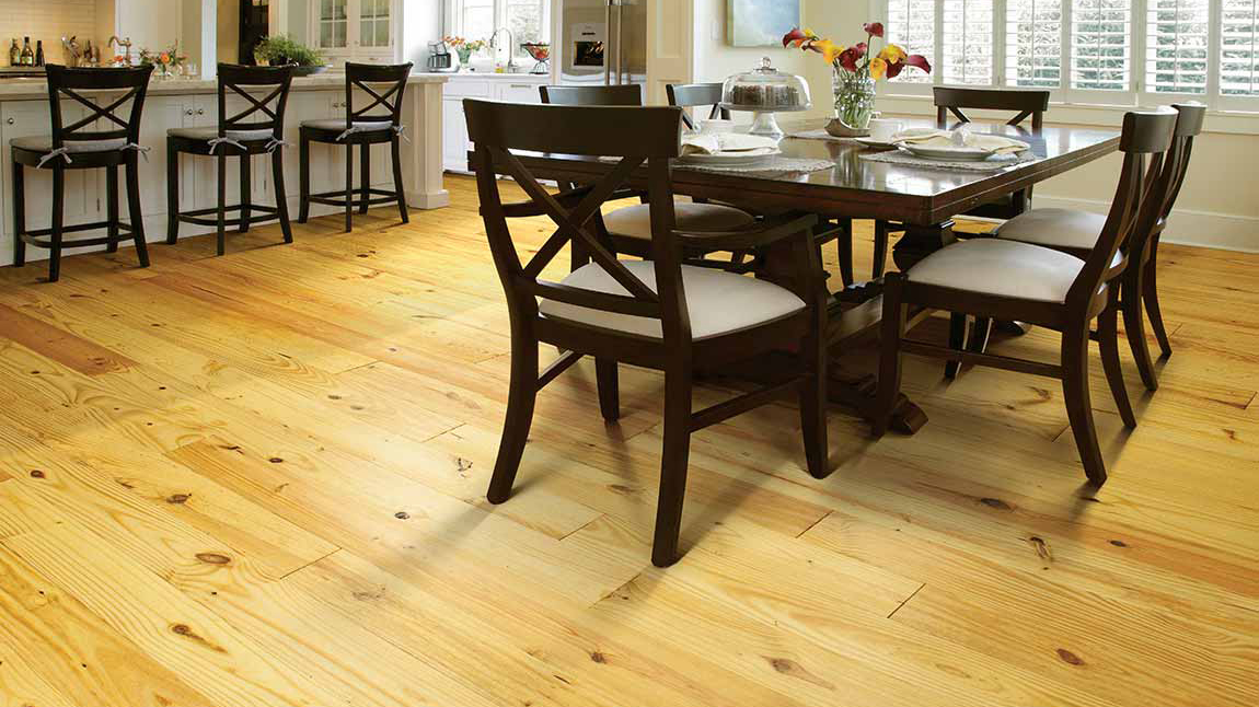Hardwood flooring in a dining room, installation services available