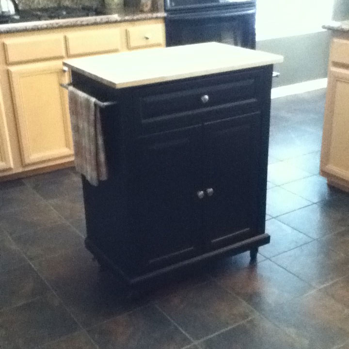 Kitchen interior room scene dark colored flooring