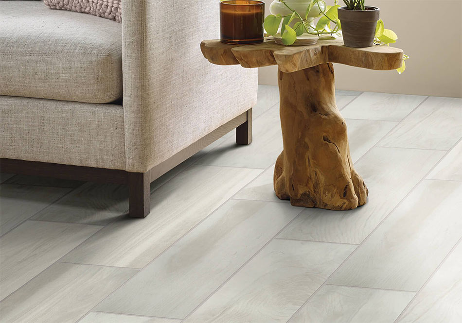 Tile floor with beautiful side table and white chair